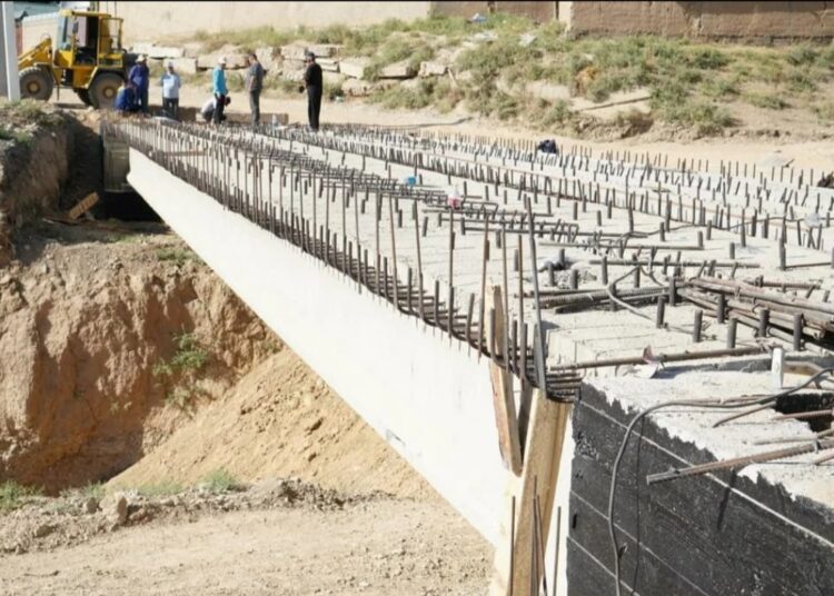 ЕКІ АУДАНДЫ ЖАЛҒАП ТҰРҒАН АСПАЛЫ КӨПІР ҚАЙТА ЖАҢҒЫРУДА